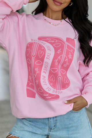 Waiting For The Other Boot To Drop Light Pink Graphic Sweatshirt, Pink Lily - A Blissfully Beautiful Boutique