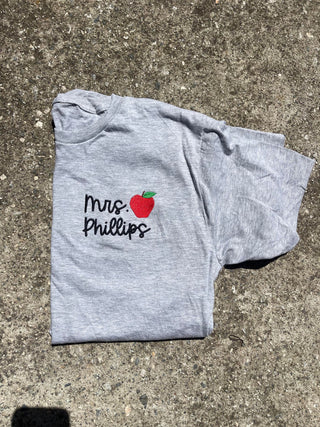 Embroidered Left Chest Custom Name with Apple | Teacher Gift | QUICK SHIP, Merch Girls - A Blissfully Beautiful Boutique