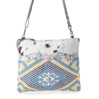 Myra Tufts Pattern Woven Hairon Crossbody â€“ Tribal Geometric Print with Leather Strap and Studded Accents, Myra USA - A Blissfully Beautiful Boutique