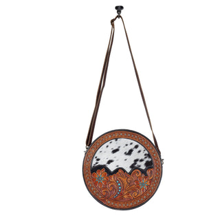 Myra Simply Sober Round Hairon Leather Crossbody â€“ Handtooled Floral & Cowhide Circle Bag for Carnival Adventures, Myra USA - A Blissfully Beautiful Boutique