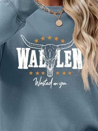 Graphic Round Neck Dropped Shoulder Sweatshirt, Trendsi - A Blissfully Beautiful Boutique